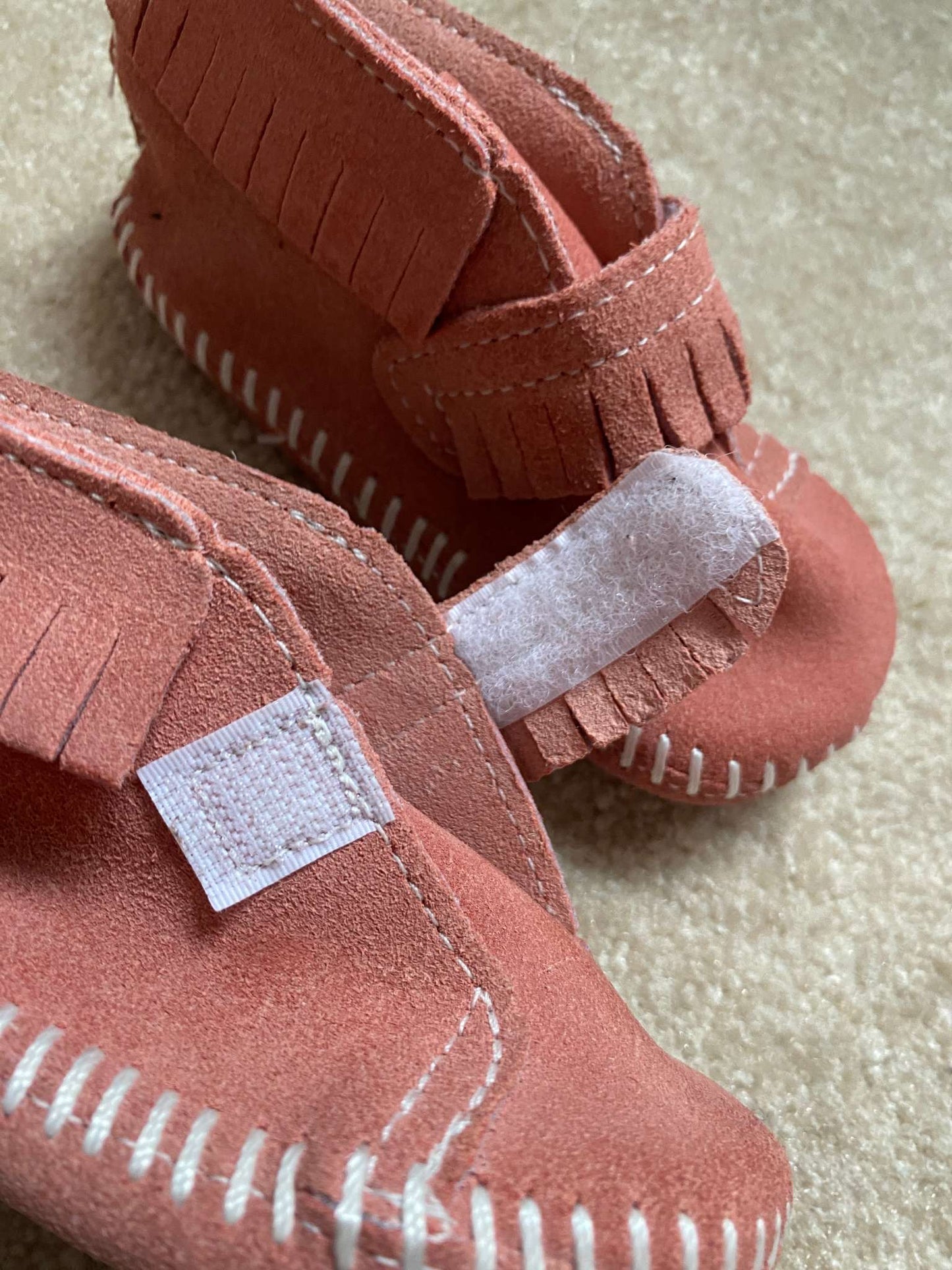 Pink Moccasin style shoes. Front strap bootie from Minnetonka Moccasin, Shoes 4 (Baby: 0-12 mth)