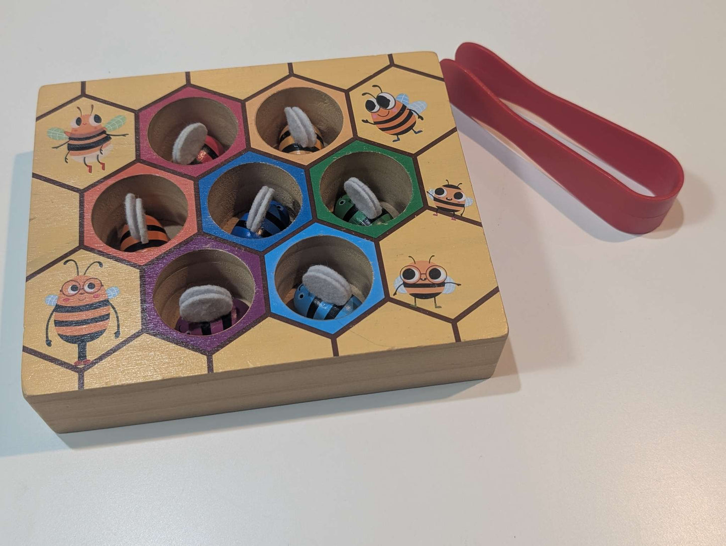 Wooden beehive sorting toy