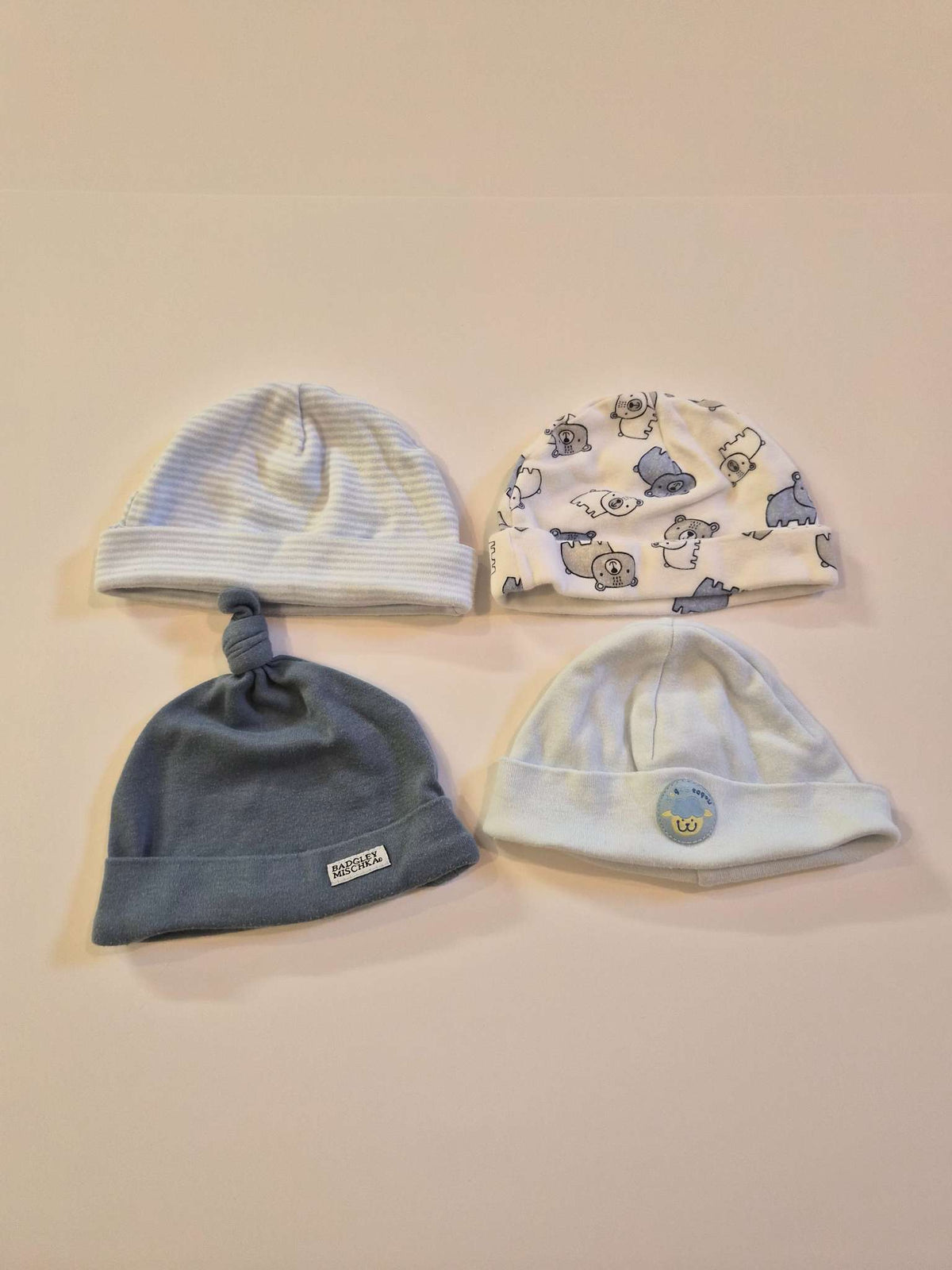 Bundle of 4 blue NB hats