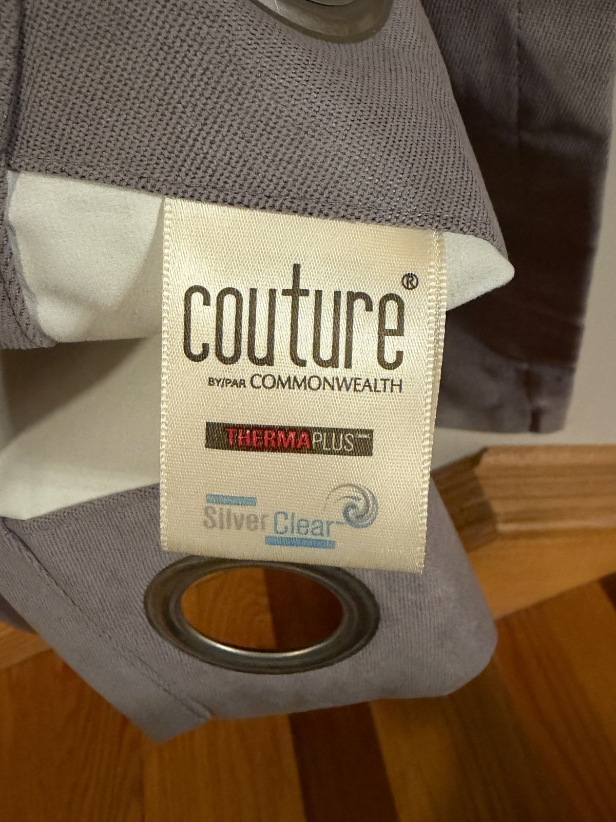 Grey colored Blackout Thermaplus curtains with grommets