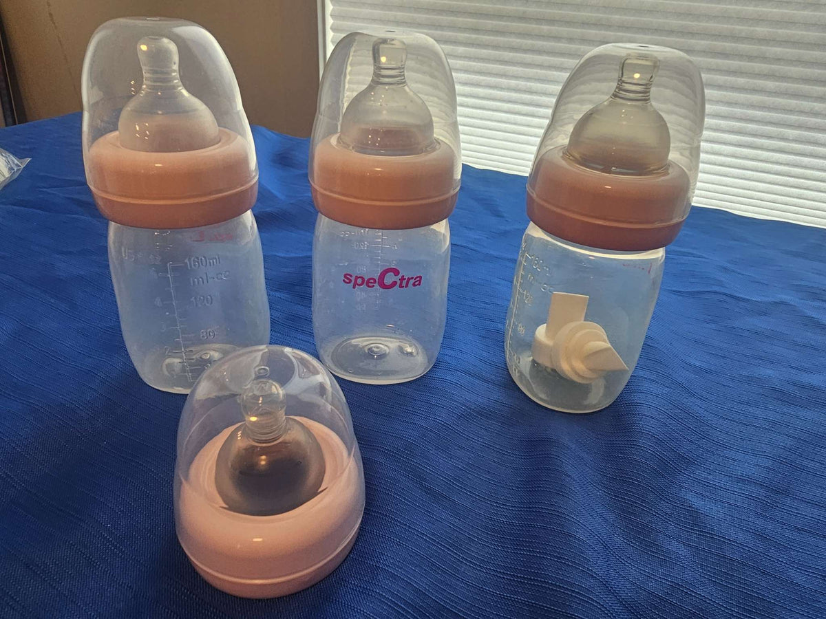 Spectra pump bottles nipples duckbill valves caps
