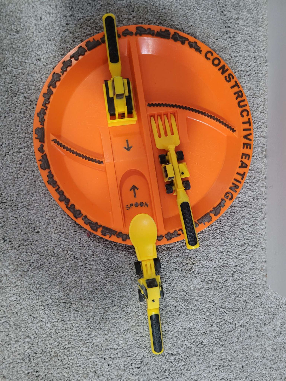Construction plate with fun utensil