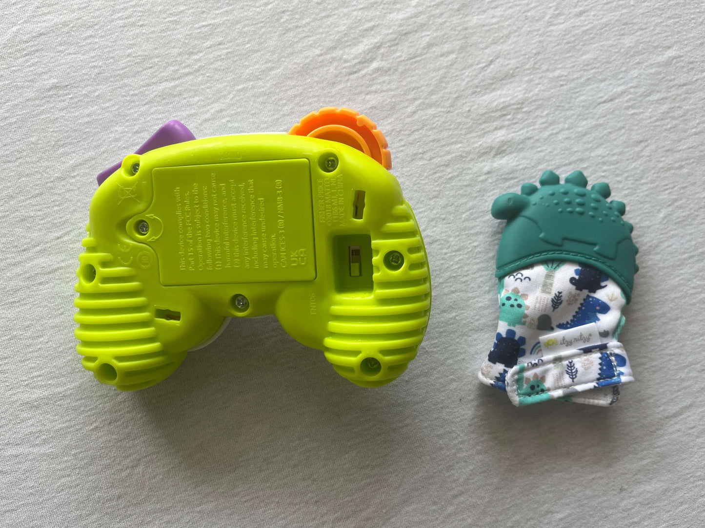 Baby Munch Mitt and Fisher Price Toy