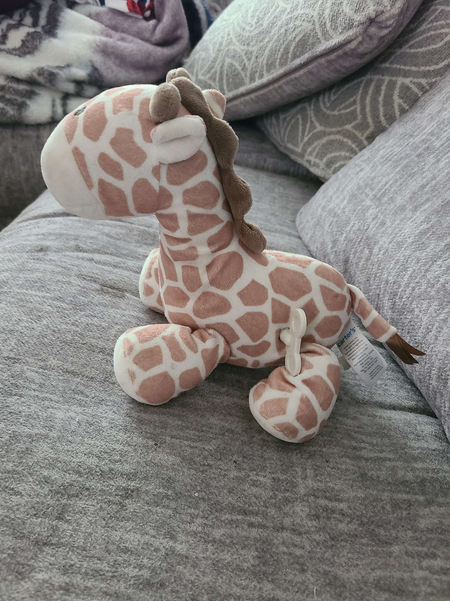 Carter's giraffe musical toy