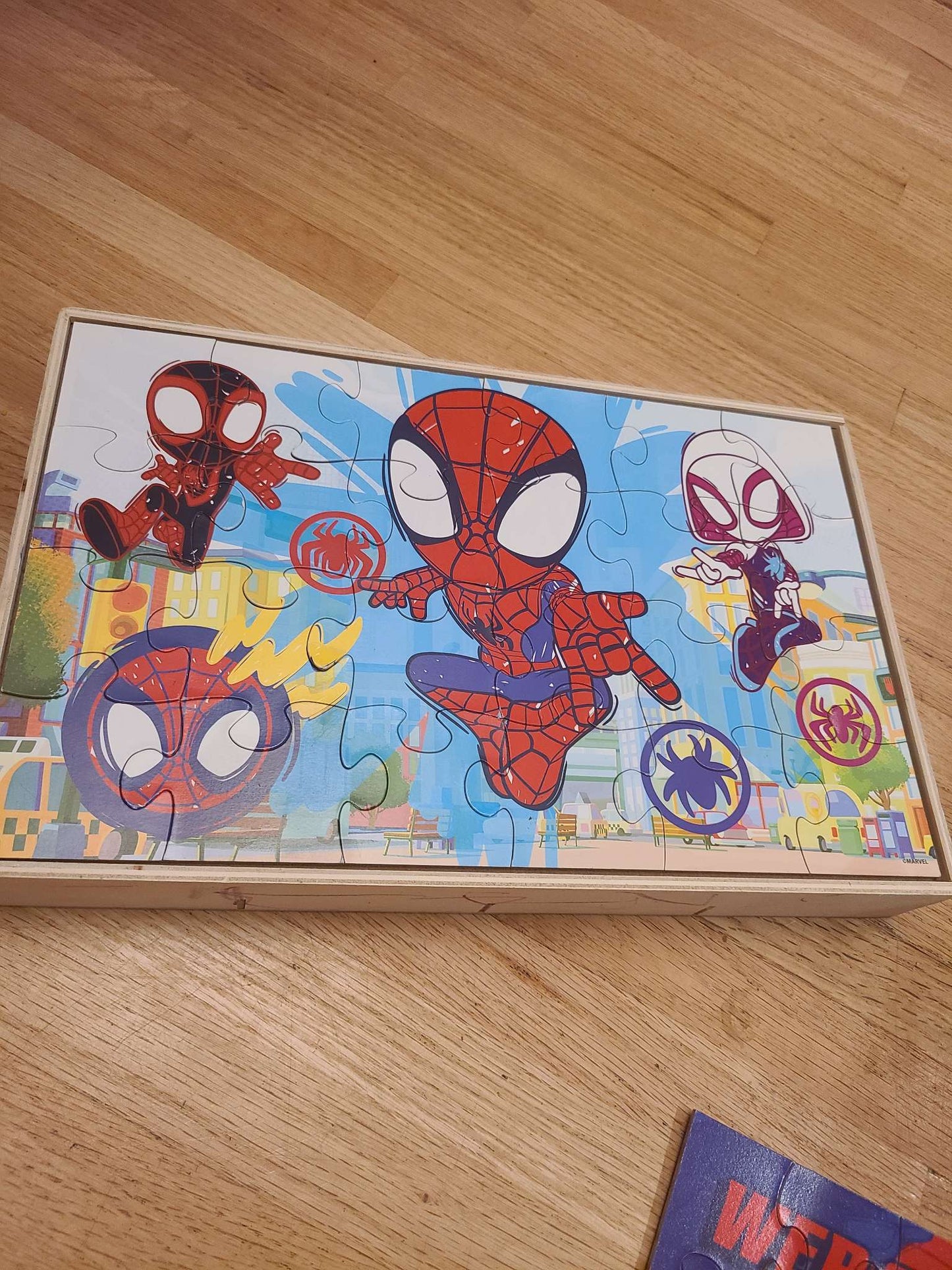 Wooden Spiderman puzzles.. 7 puzzles with case