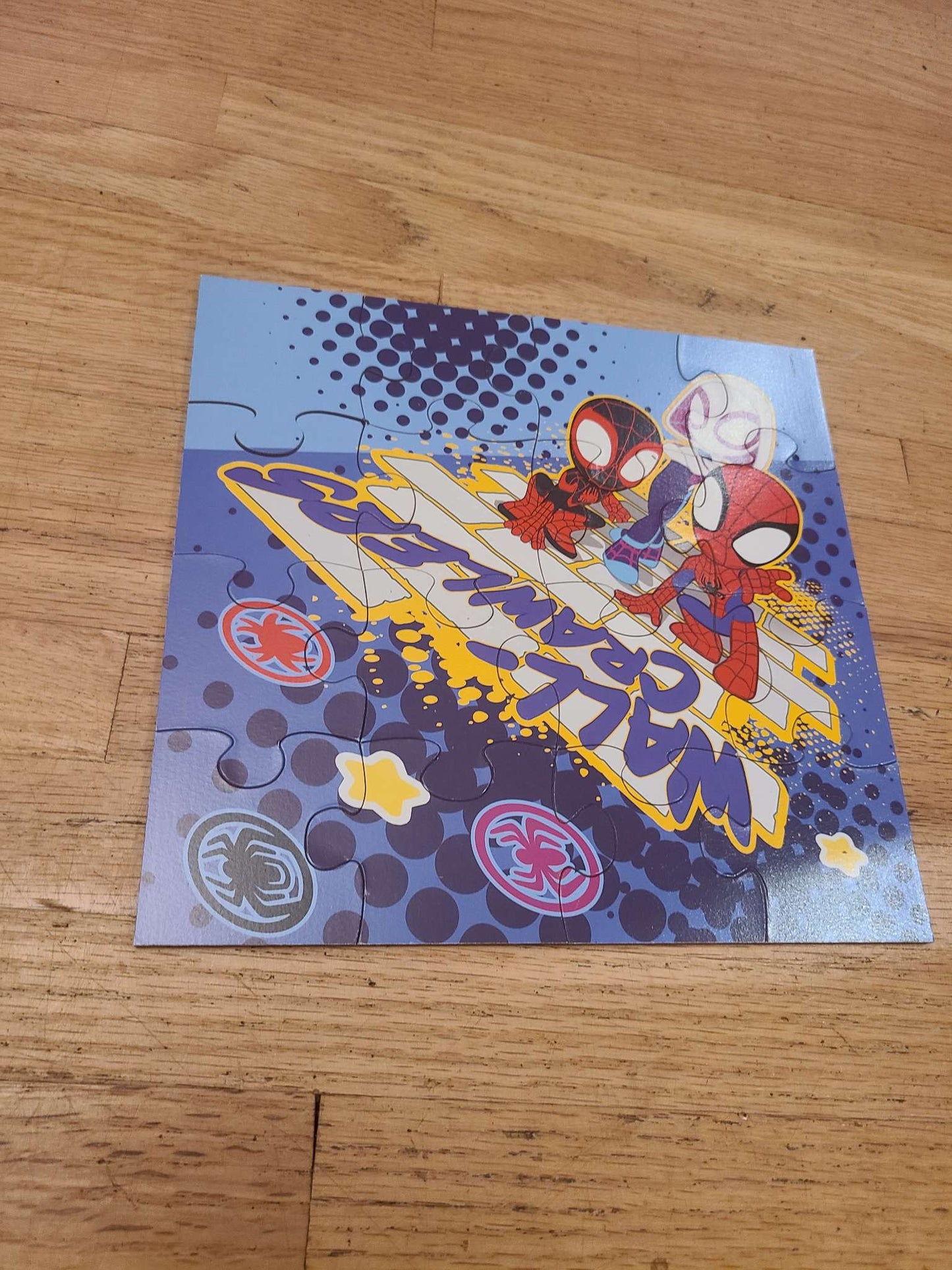 Wooden Spiderman puzzles.. 7 puzzles with case