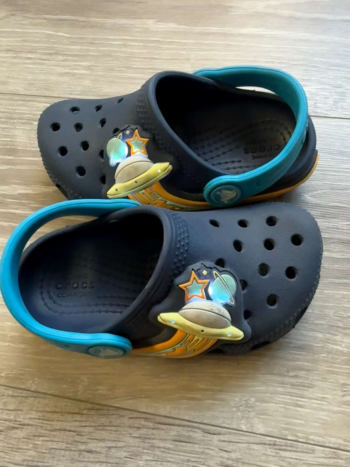 Light-up Space Crocs size 7; MSRP $54.99, Shoes 7 (Walkers:12-24 mth)
