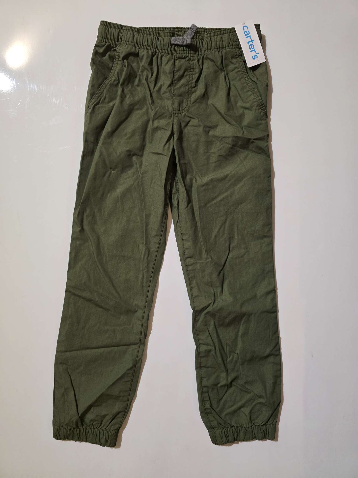 Size 10, lined pants w/ elastic waist and ankles. Retails for $30 + tax, Kids 10 (medium)
