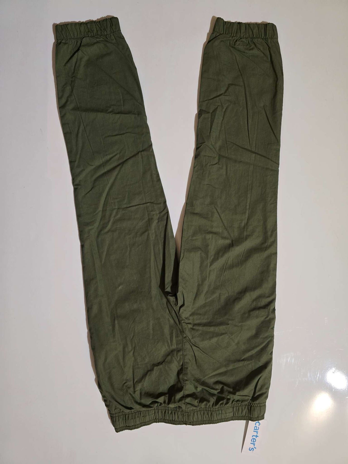 Size 10, lined pants w/ elastic waist and ankles. Retails for $30 + tax, Kids 10 (medium)