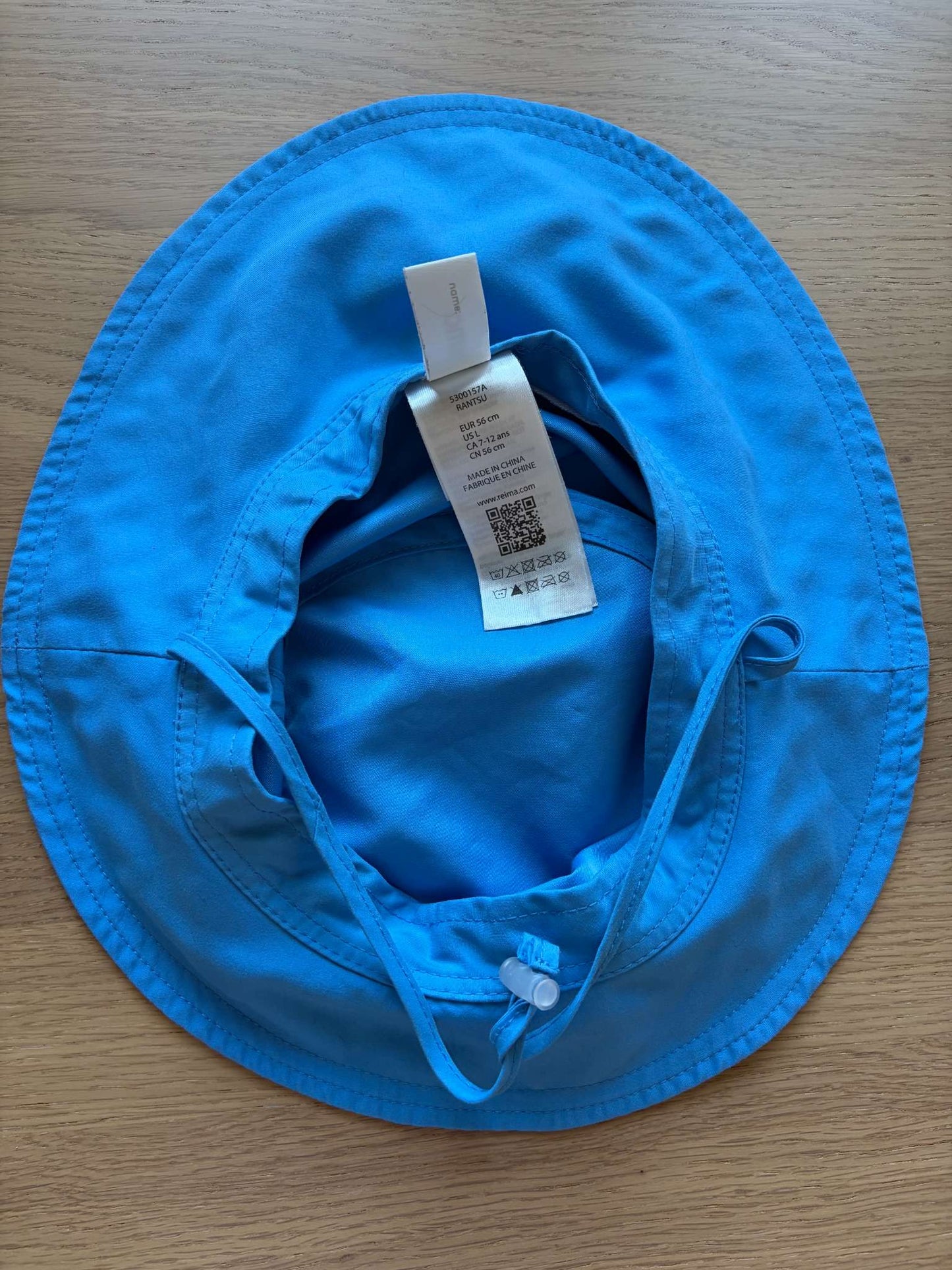 Reima Sky Blue Sunhat, Size 7-12, $40, Kids 7