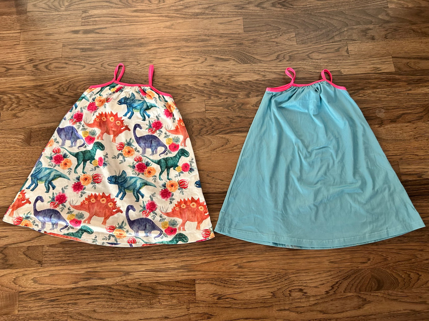 2 dinosaur dresses - Size 4/5, Kids 4/4T