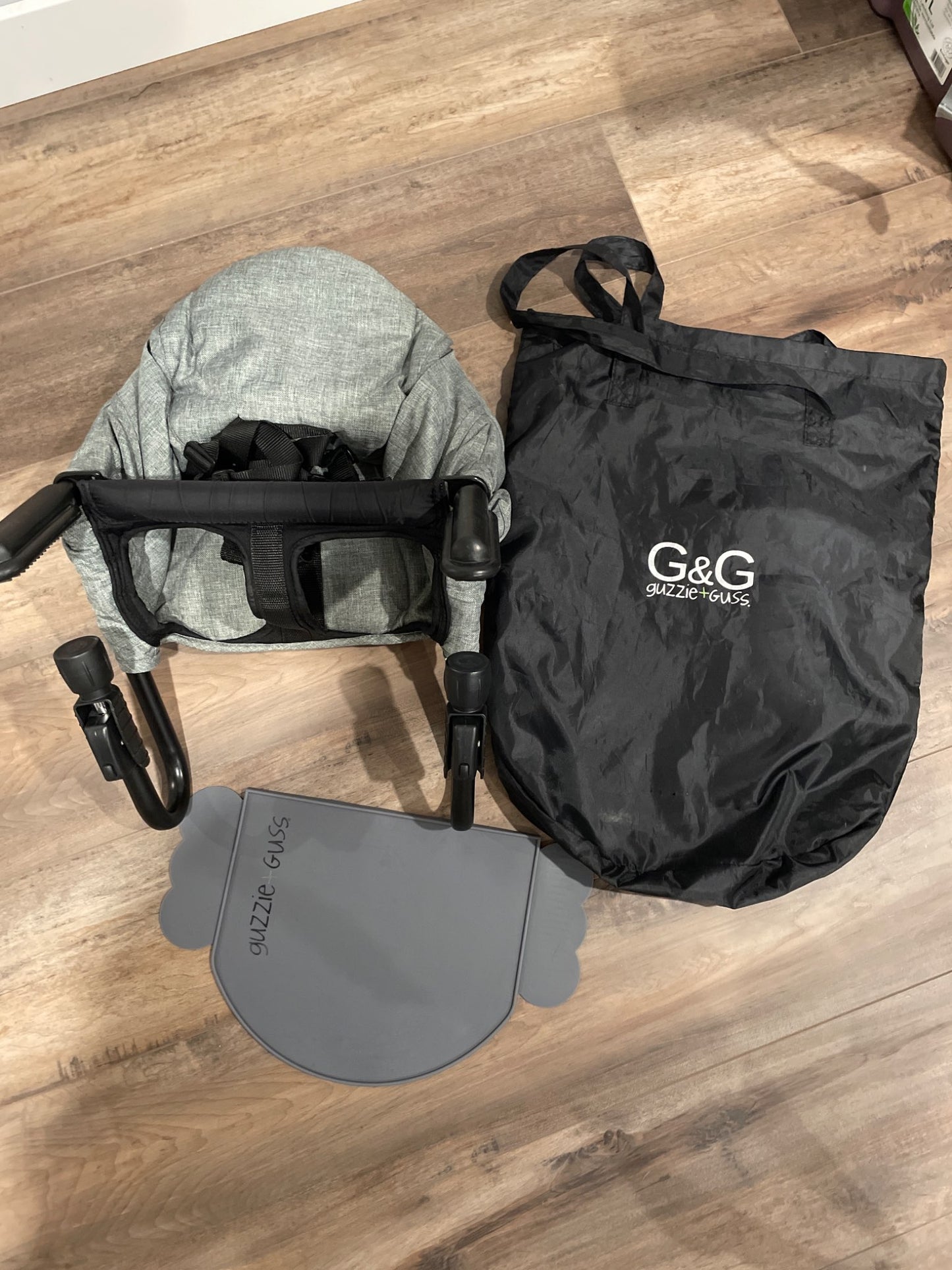 Guzzie & Guss Perch chaor and placemat Retails $140