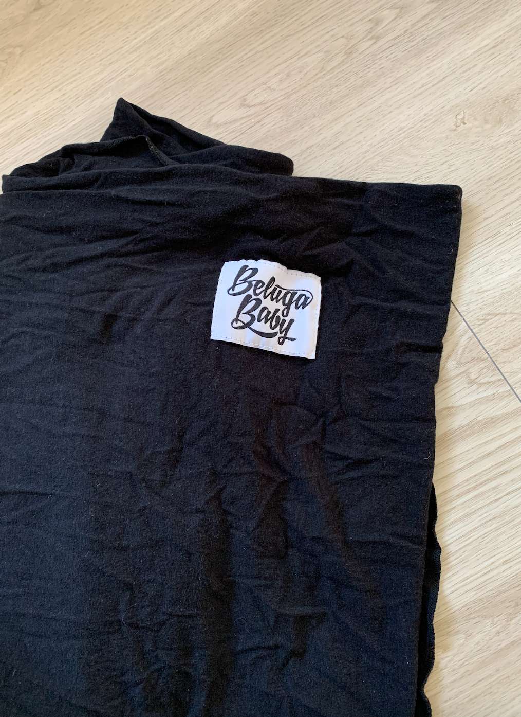 The Sawyer Beluga Baby black wrap Retails $95 Made in Canada