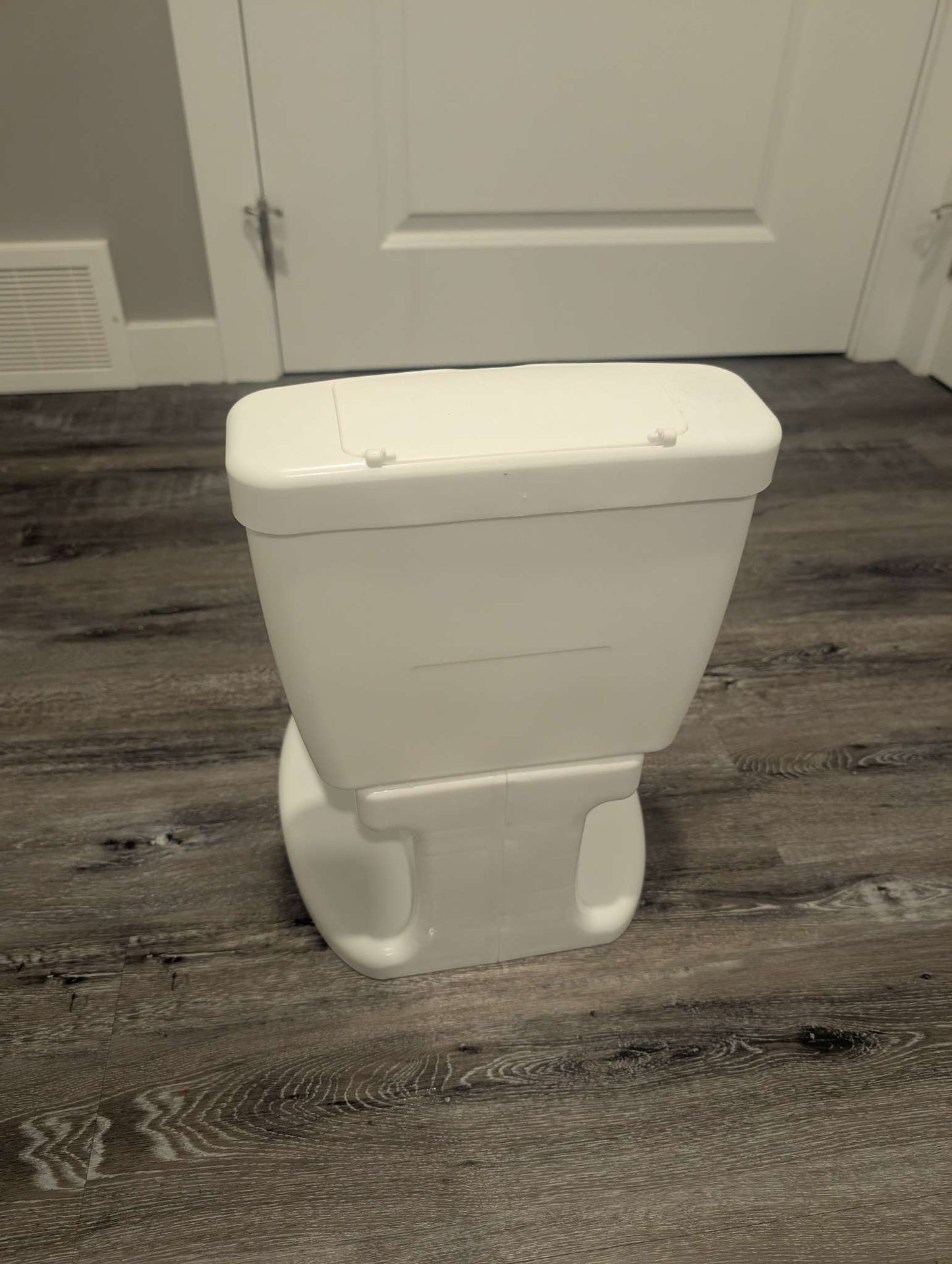 Summer Infant White Potty with Flushing Sound. MSRP $40