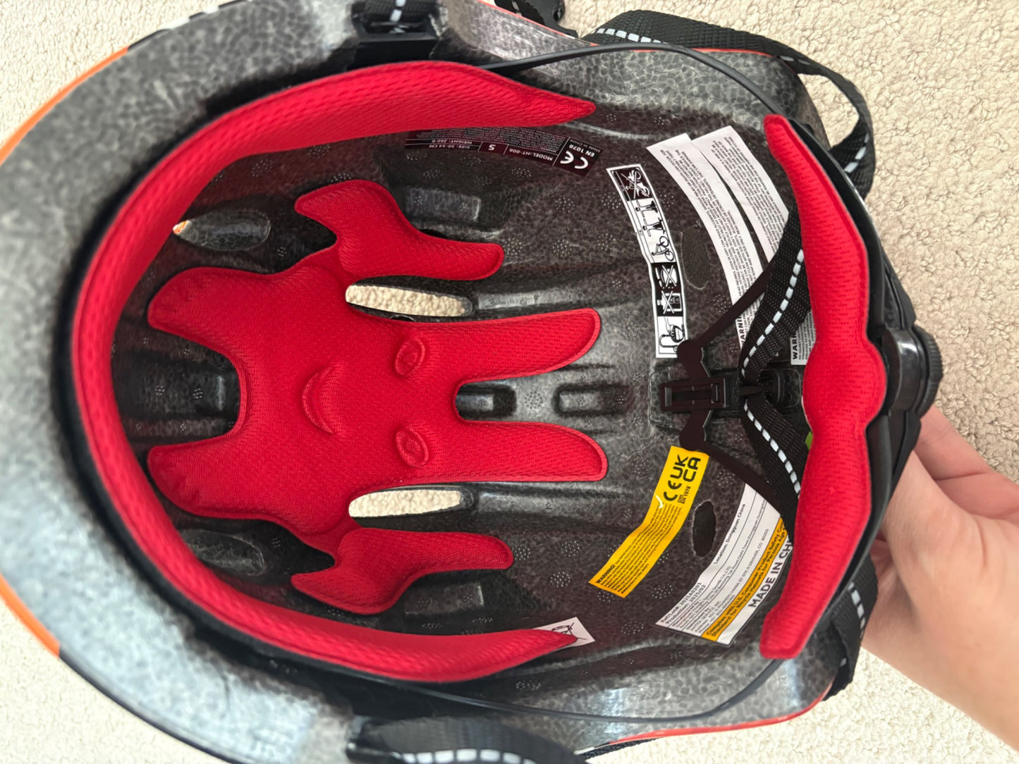 New - dinosaur bike helmet, never used, retails $30, 50-54cm head circumference