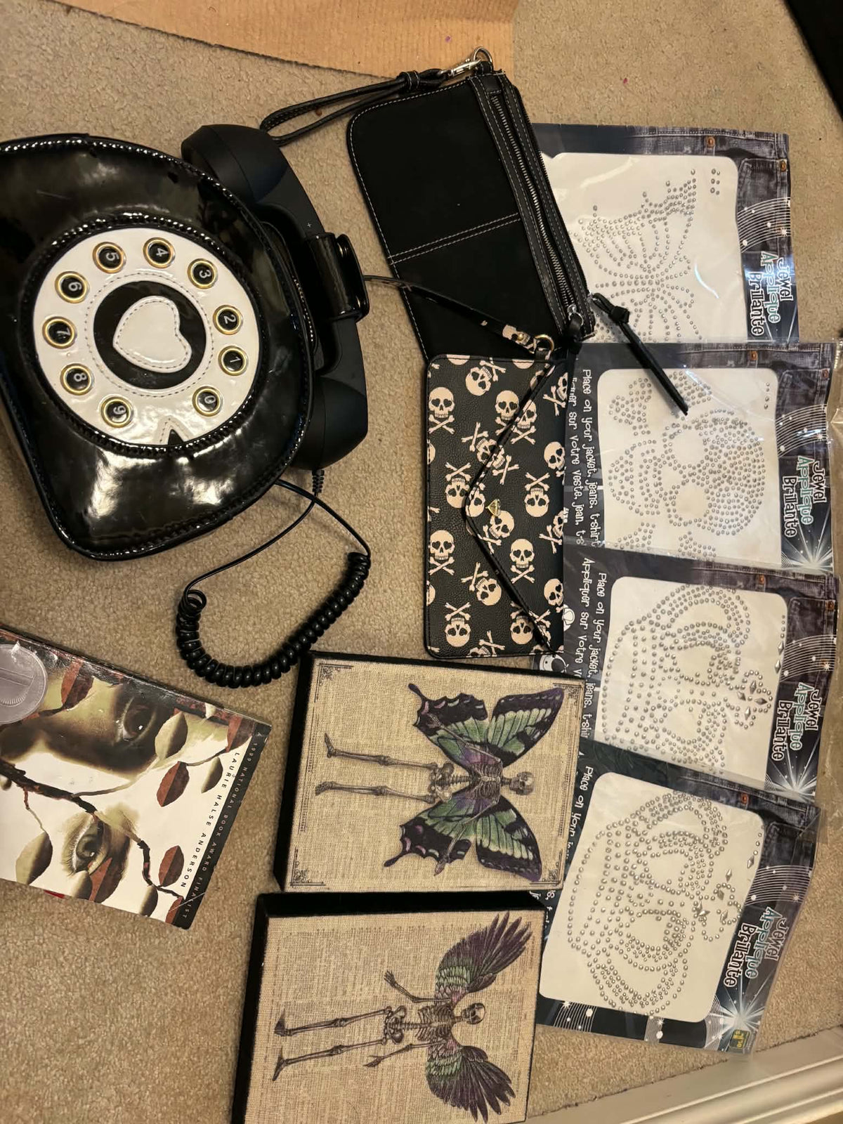 Working phone purse with black wristlet, skull wristlet, etc.