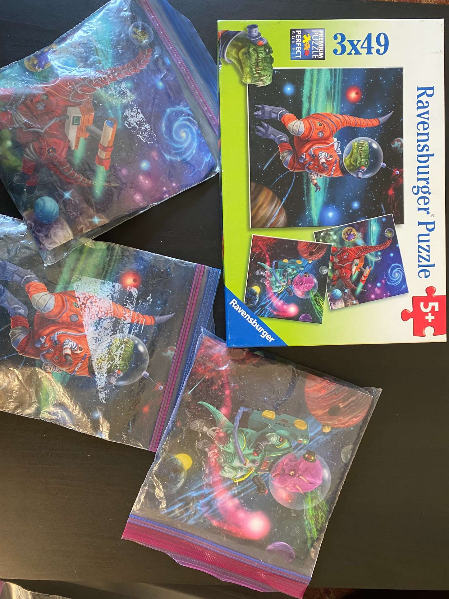 Ravensburger set of 3 puzzles - "Dinosaurs in Space"