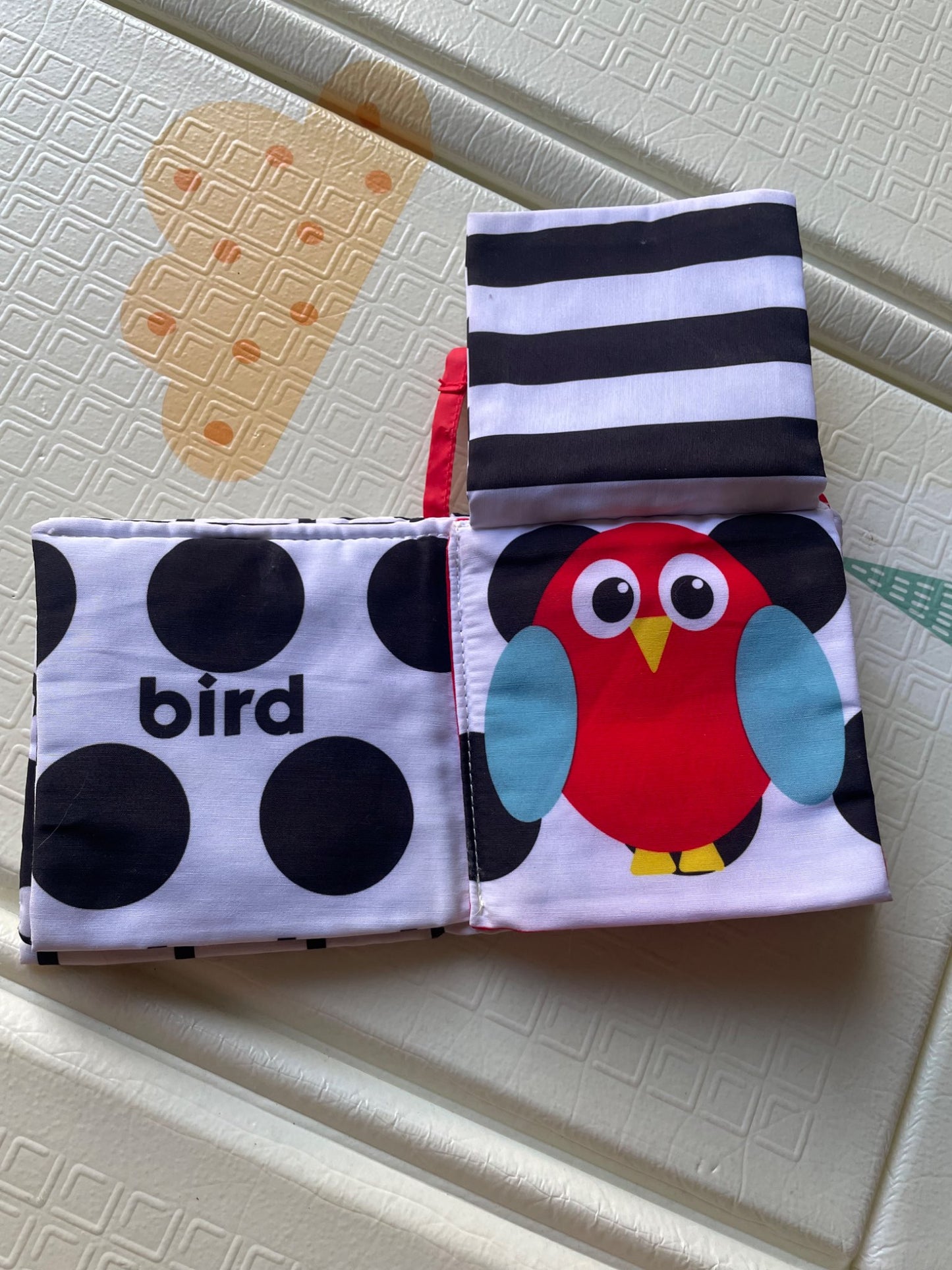 Peekaboo crinkle book