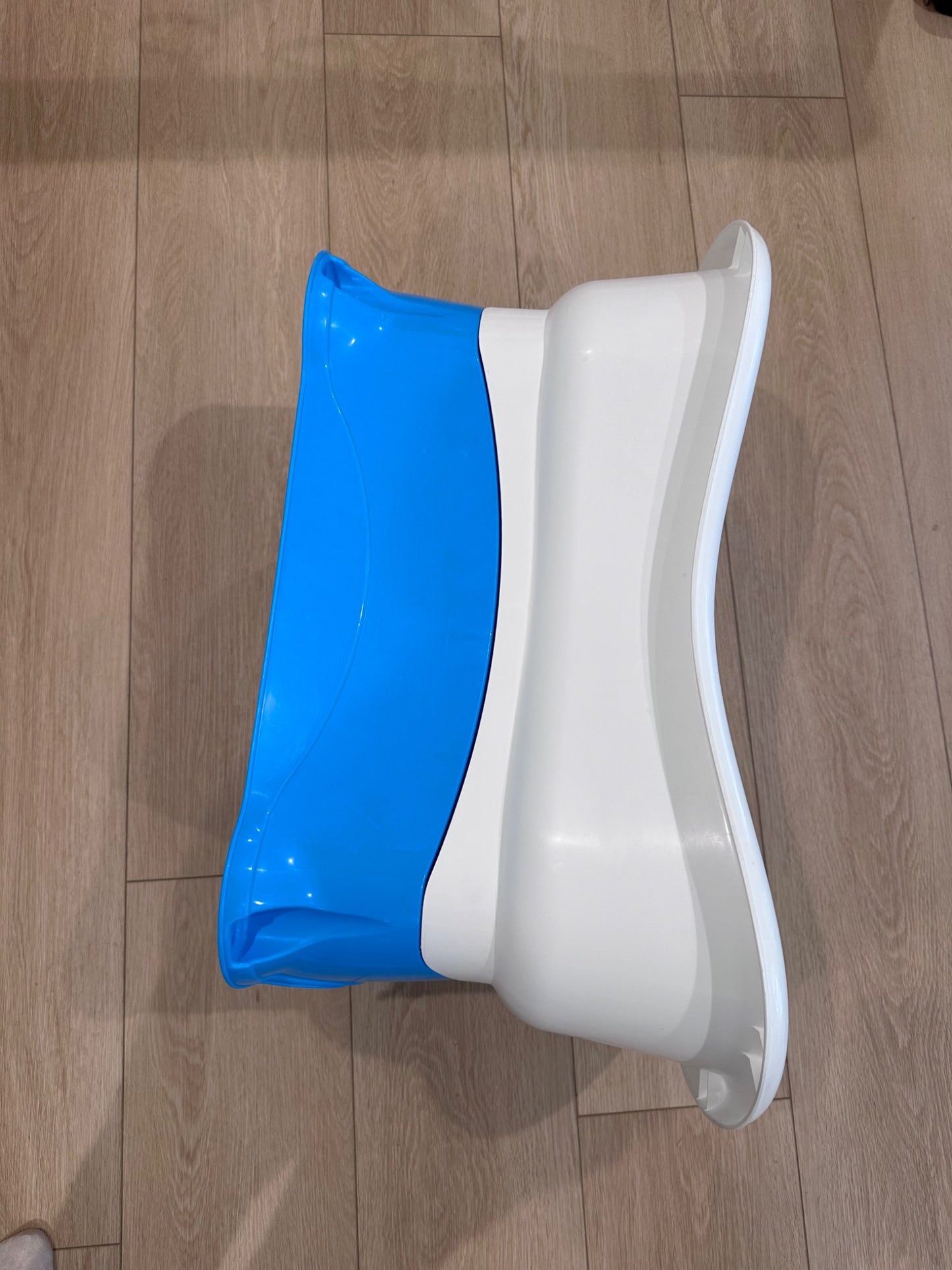 Baby bath with removable footstool