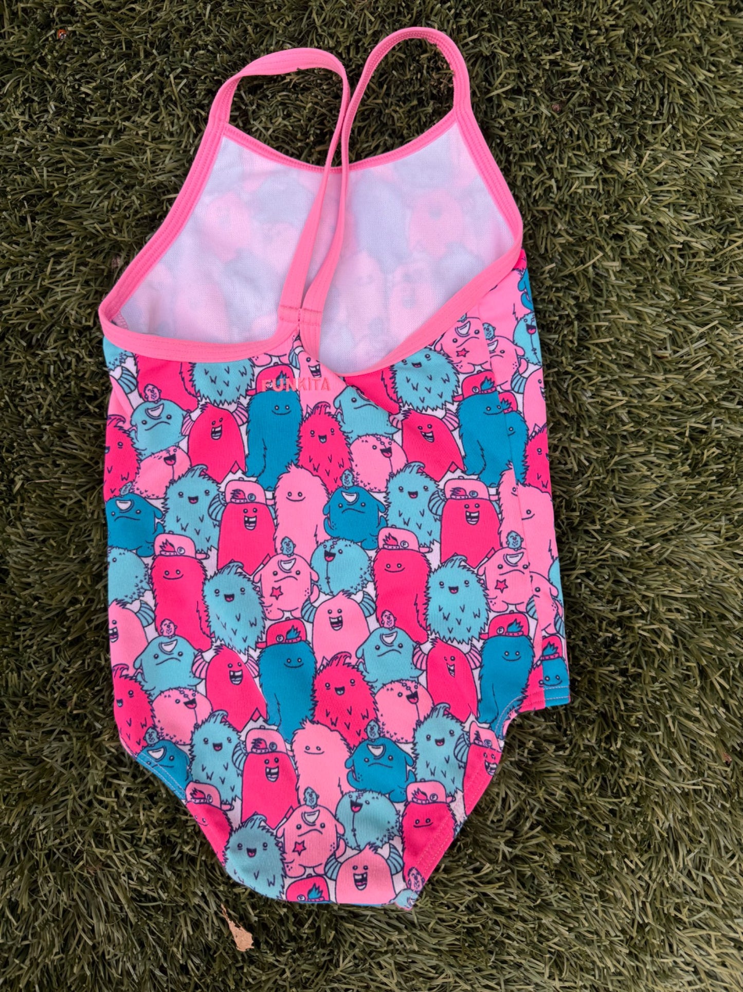 Girls bathing suit size 5. Funkita brand from Australia. Never fades never stretches. These are amazing! (Retails $67), Kids 5/5T (extra small)