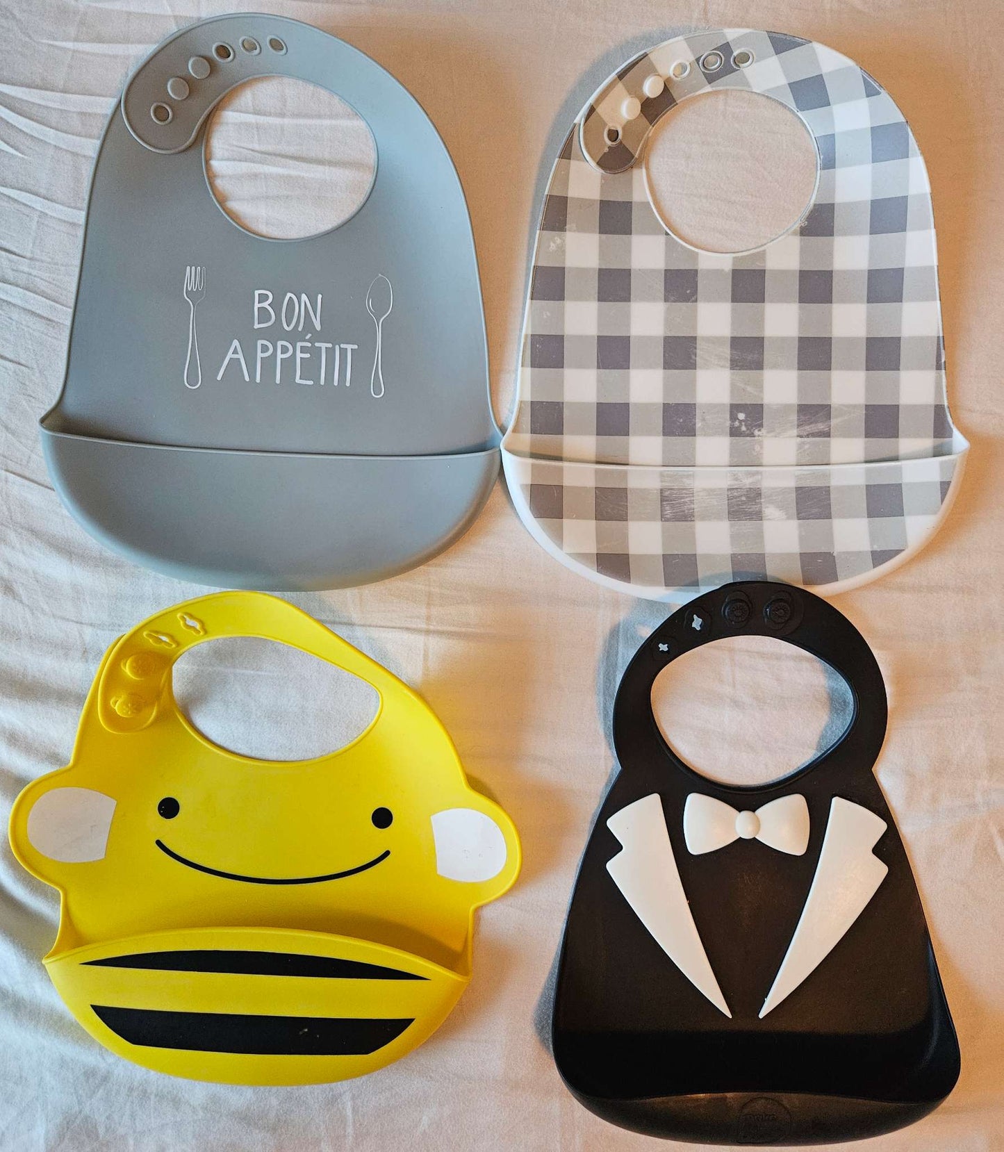 Set of 4 silicone wipeable bibs (bon appetite, Grey plaid, bee, suit)