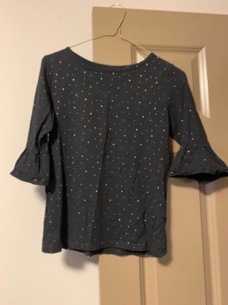 Black 3/4 length sleeve shirt. Mangunn. Sizes 10-12, Kids 10