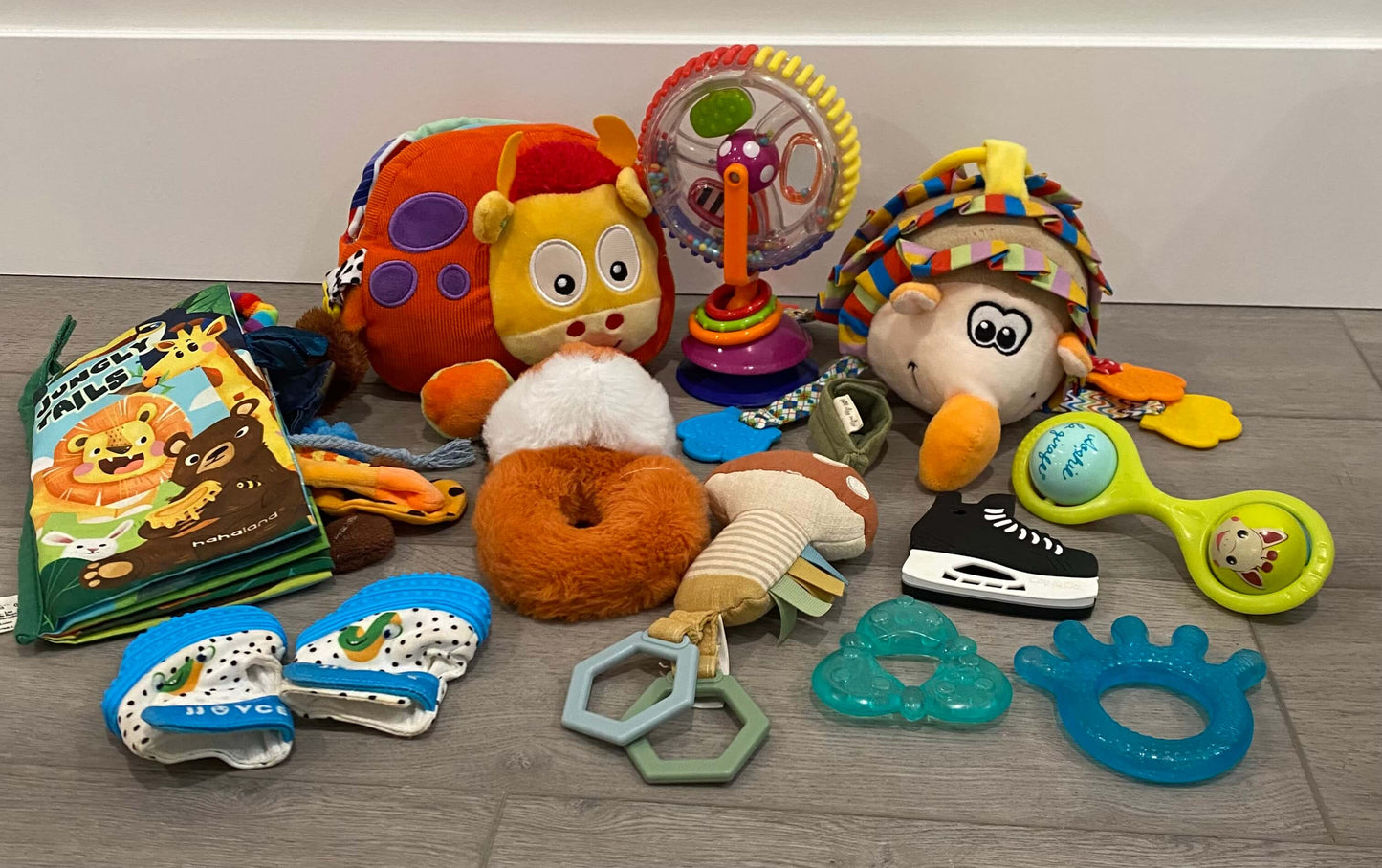 Baby toy bundle including cay+co hockey skate teether