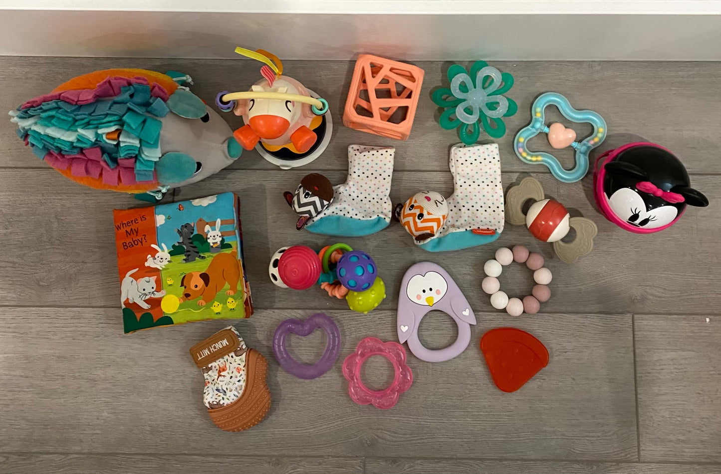Baby toy bundle including munch mitt