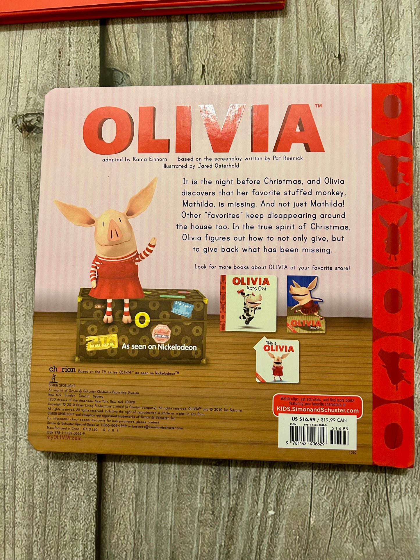 Olivia Claus & Olivia helps with Christmas hardcover books, EEUC