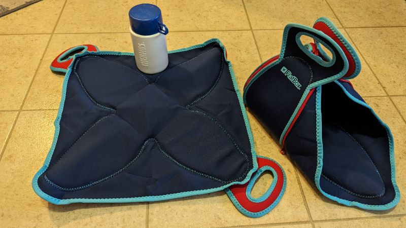 New lunch bag that becomes a flat square; retailed for $30 + tax