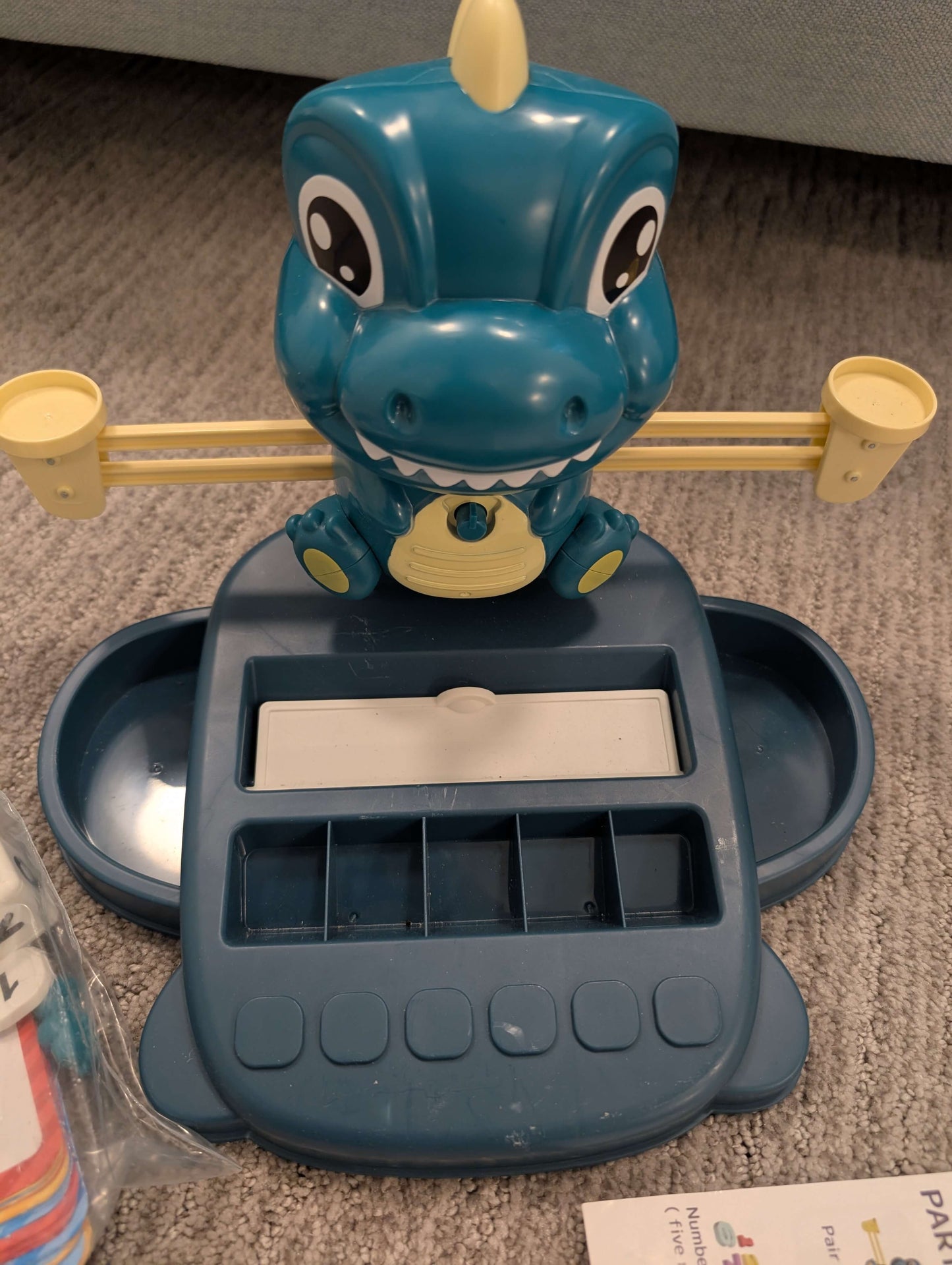 Early learning dino balance scale