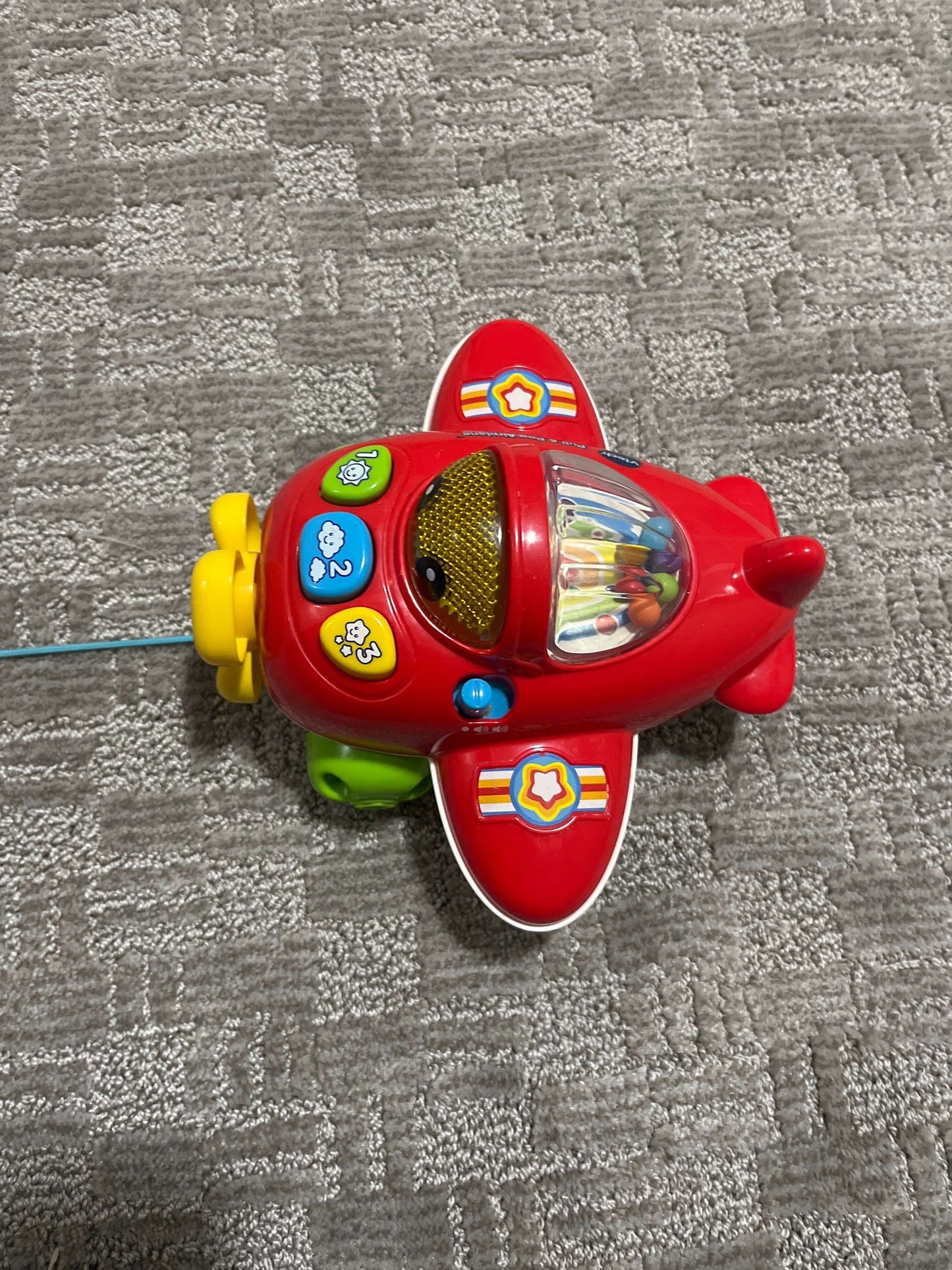 V Tech pull and pop airplane toy