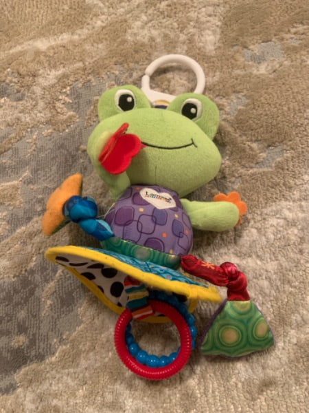 Lamaze frog on lily pad sensory toy