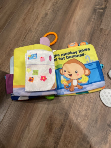 Musical fabric book and elephant teether