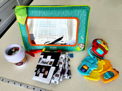 Infant toy bundle, mirror, rattle, book, keys