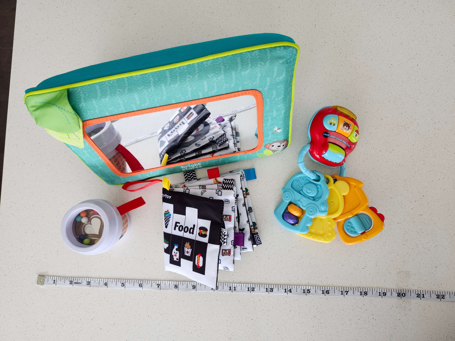 Infant toy bundle, mirror, rattle, book, keys