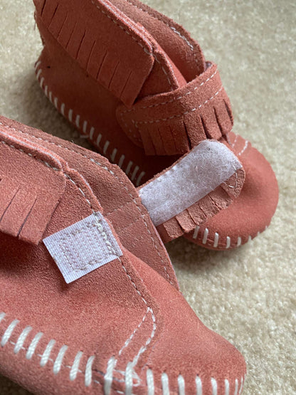 Pink Moccasin style shoes. Front strap bootie from Minnetonka Moccasin, Shoes 4 (Baby: 0-12 mth)