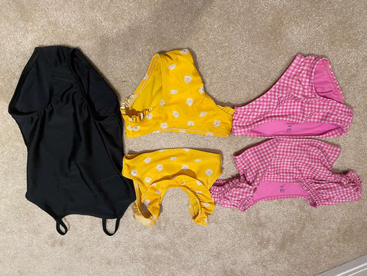 3x: Little girls bathing suits: Full black, 2 pieces: pink and yellow.