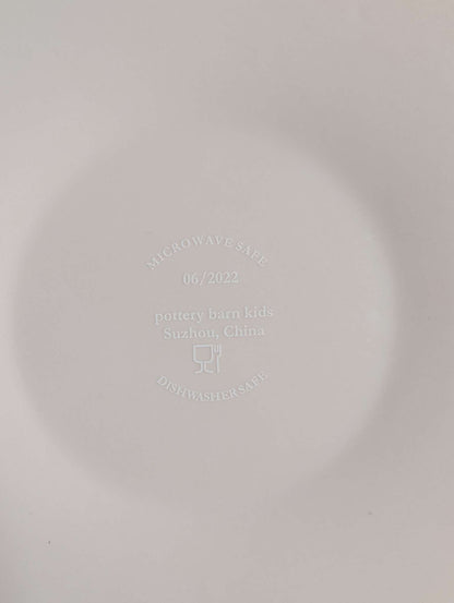Pottery Barn bunny shape silicone plate with a bib