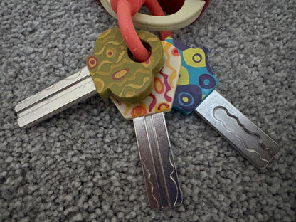 B. toys Pretend Play Toy Car Keys with Lights & Sounds, 10+ Months