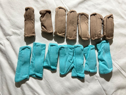 Two sets of Pavlik harness padded covers