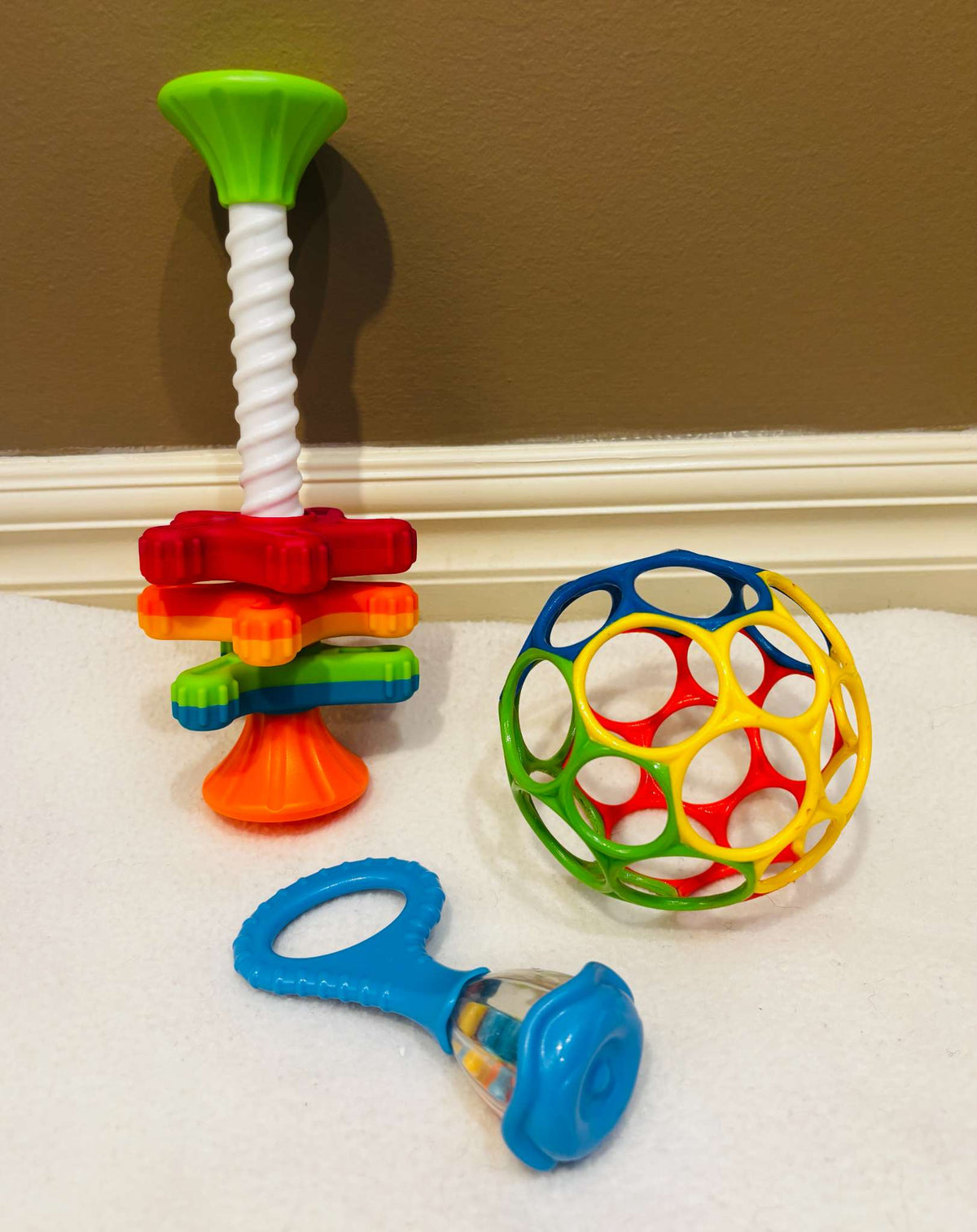 Fat Brain Toys MiniSpinny, Oball & Halilit Baby Toy Bundle – 3 Pieces