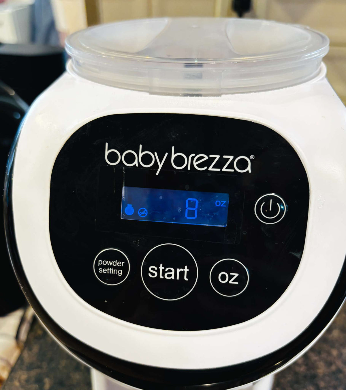 Baby Brezza Formula Pro Mini – Automatic Formula Maker + Travel Bag & Riser