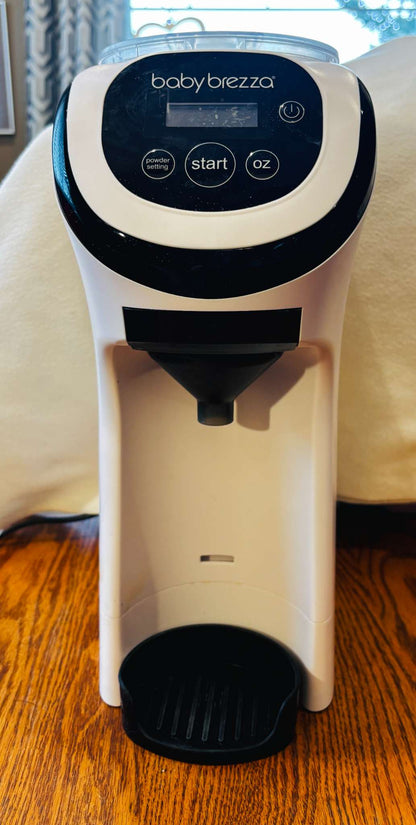 Baby Brezza Formula Pro Mini – Automatic Formula Maker + Travel Bag & Riser