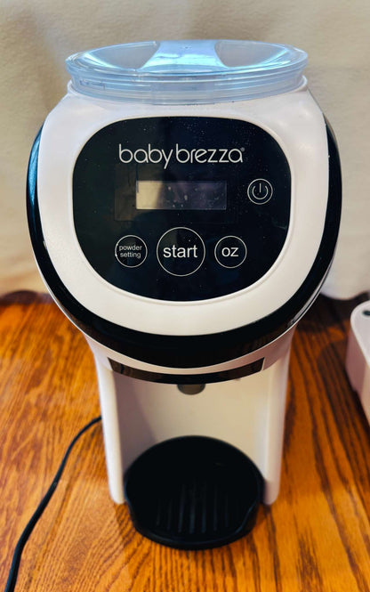 Baby Brezza Formula Pro Mini – Automatic Formula Maker + Travel Bag & Riser
