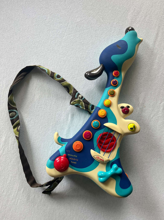 B. Toys Woofer Interactive Dog Guitar