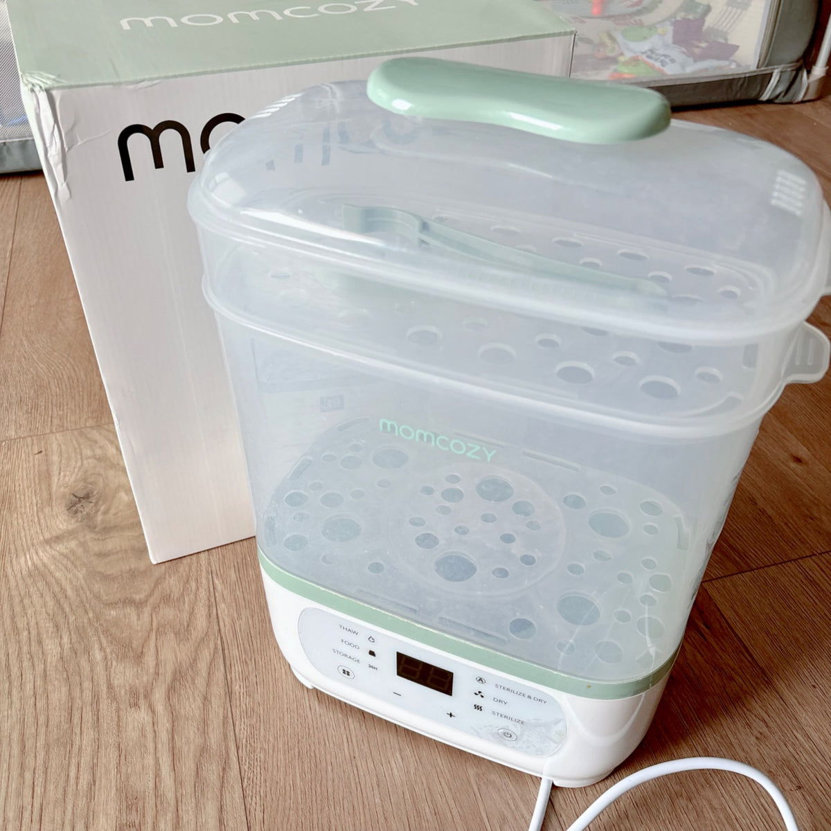 MOMCOZY bottle sterilizer and dryer 8-in-1 electric steamer, MSRP $130
