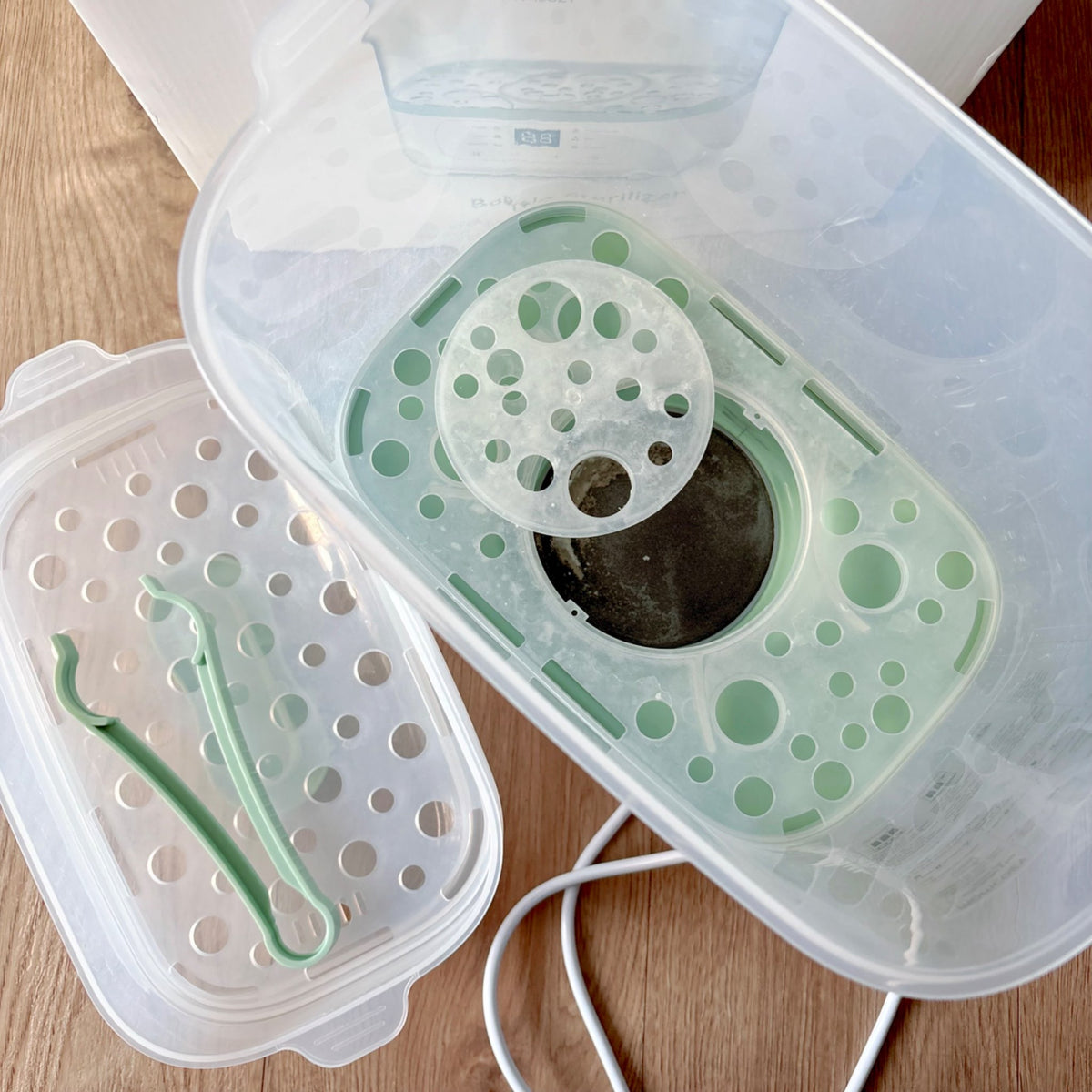MOMCOZY bottle sterilizer and dryer 8-in-1 electric steamer, MSRP $130