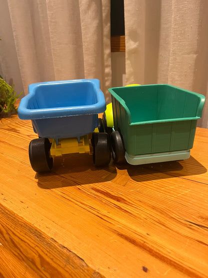 Two Plastic Medium-Sized Trucks