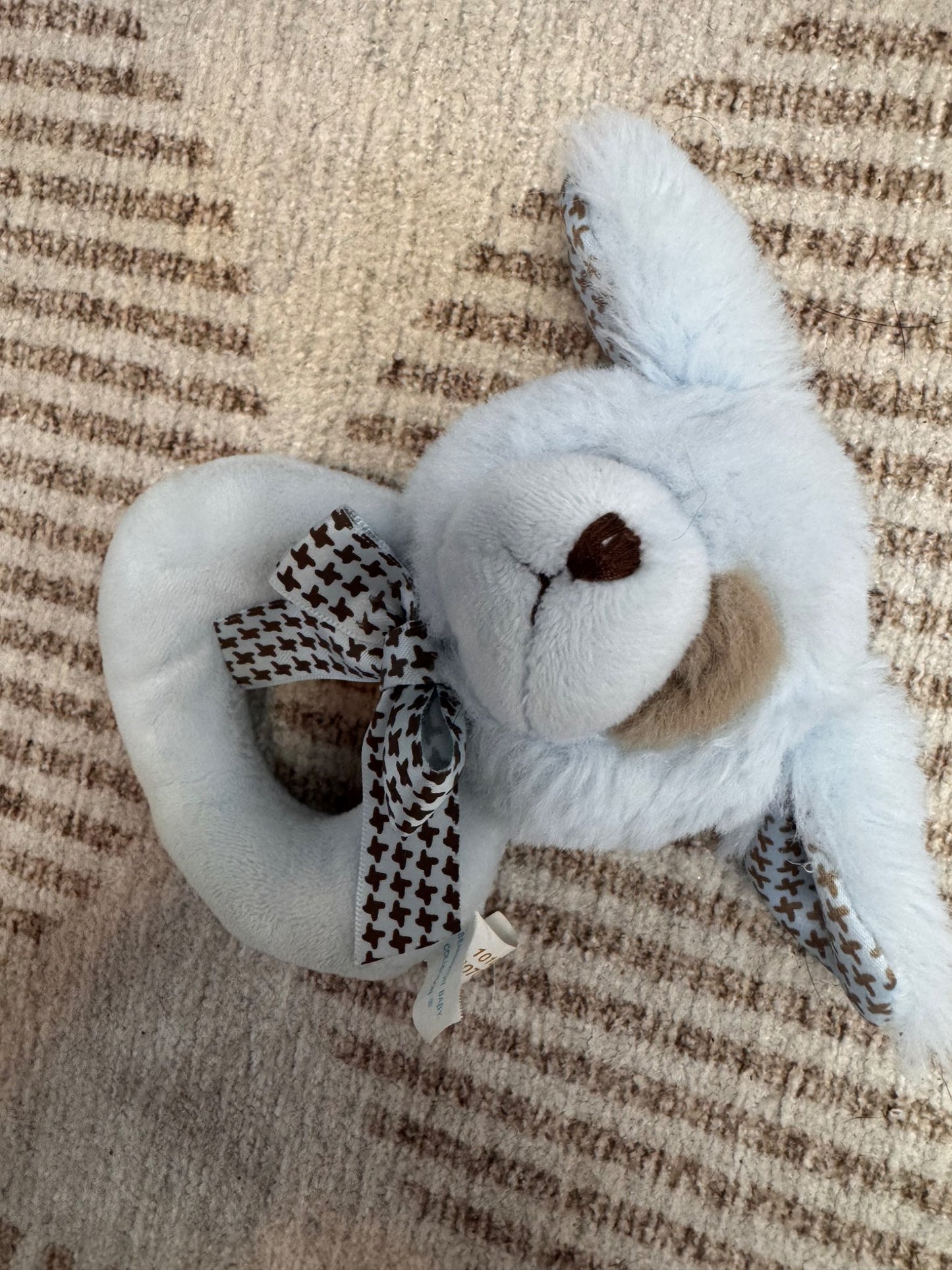 3 baby rattles and an Elephant Soother Holder